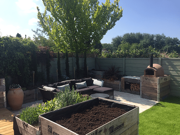 pallet collar planters in a stylish garden