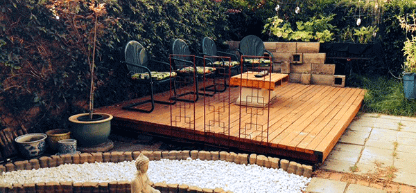 Pallet decking with garden furniture on top