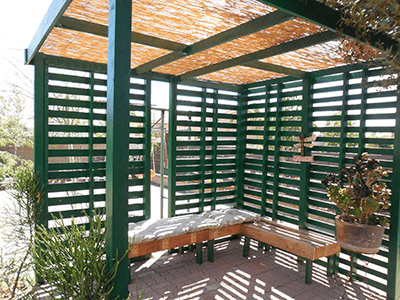 pallet pergola with benches and shade