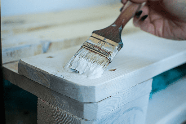 Pallet being painted white